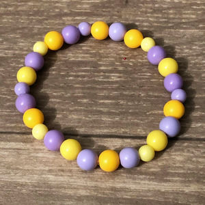 Purple and yellow beaded stretch bracelet available now